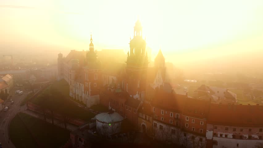 Aerial view of Wawel Castle during foggy sunrise, Krakow, Poland