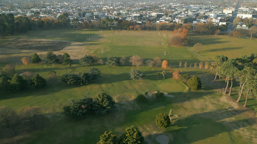 Hagley Park Green Trees And Grass Christchurch New Zealand Drone Track Left 4K 60FPS