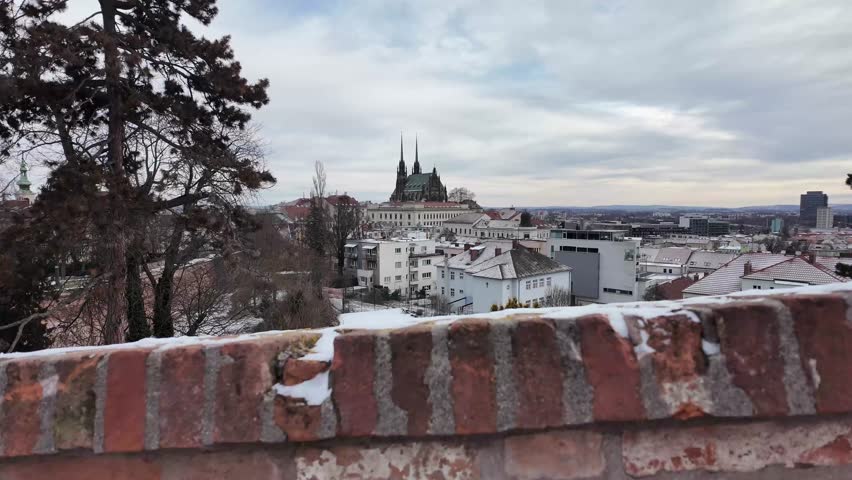 Cinematic Slow Motion View Of Snowy Brno Old Town And Petrov Cathedral