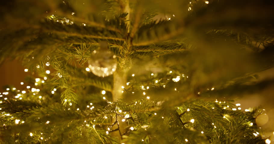 Close-up view of a beautifully adorned Christmas tree, capturing the essence of the holiday season.