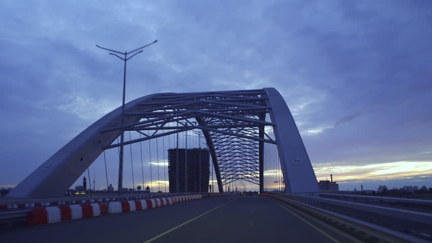 Driving Across New Podilsko Voskresensky Bridge In Kyiv At Dusk