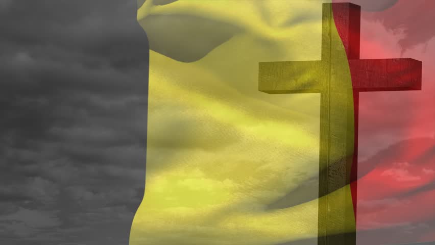 Vertical tricolour flag billowing from gusts, folding and showing wooden cross against overcast sky. Banner, wind, movement, translucence, monument, outdoors, somber