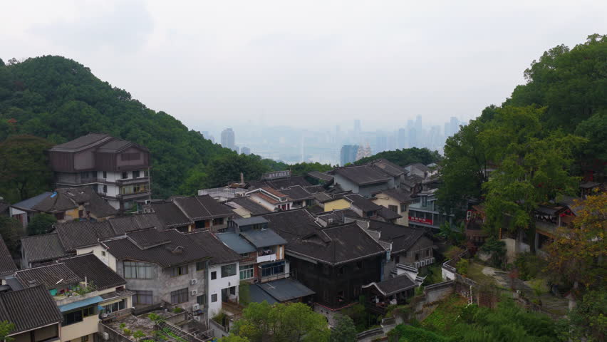 Overview Of Hazy Skyline Of Chongqing From Huangjueya Old Street In China. aerial shot