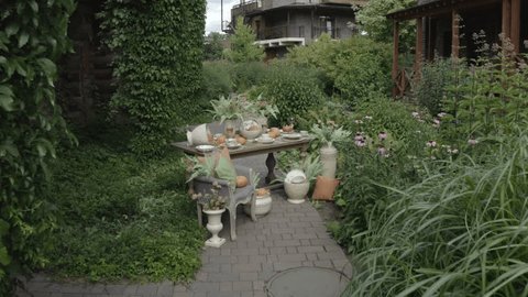Aerial View of Rustic Pumpkin Decorated Table in Lush Garden