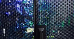 On load data gauges and graphs animating over rack door, monitoring real time network metrics. Technology, networking, cybersecurity, data analysis, digital interface, industrial, futuristic - Powered by Shutterstock - Get 15% off with code: PIKWIZARD15