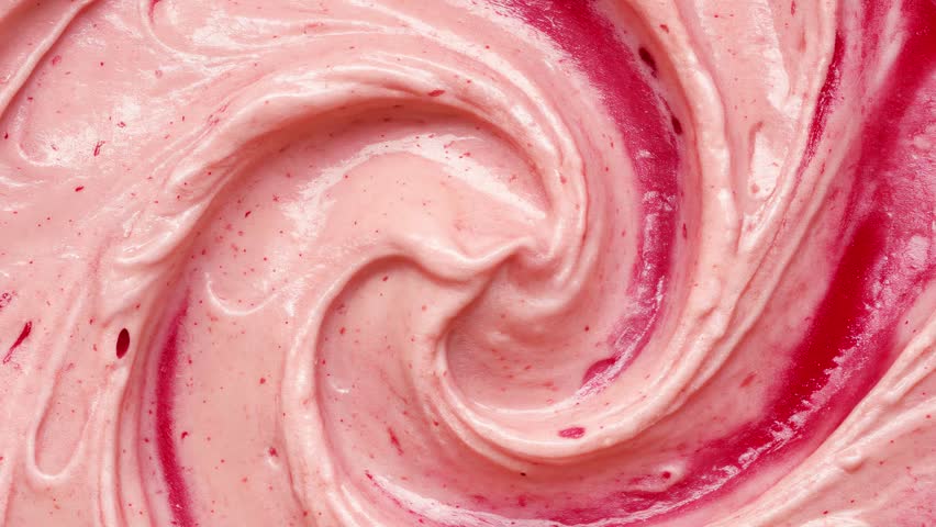 A soft abstract background for promos, motion videos, or concept videos. 4K video of a pink strawberry milk swirl texture. Can also be used to promote food and beverage products on social media.