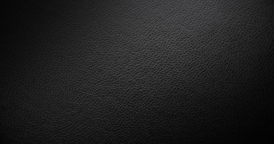 Surface of black leather, slowly rotating. Use for background and texture.	A high-resolution dark leather texture background captured in smooth, rotational motion. Use for background and texture.