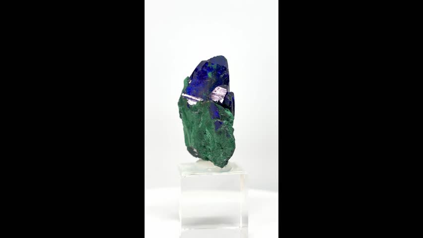 Close-up video of azurite and malachite mineral specimen showing vibrant blue and green crystalline textures and natural geological patterns