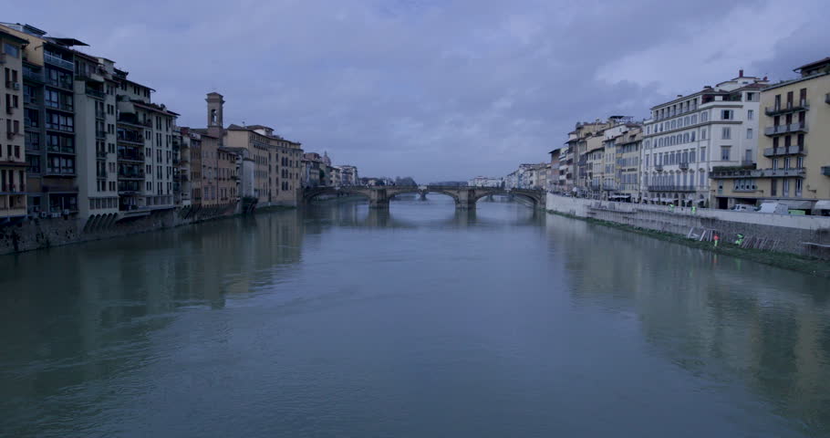 Florence Riverside Architecture with Ancient Bridge Under Cloudy Sky, Italy