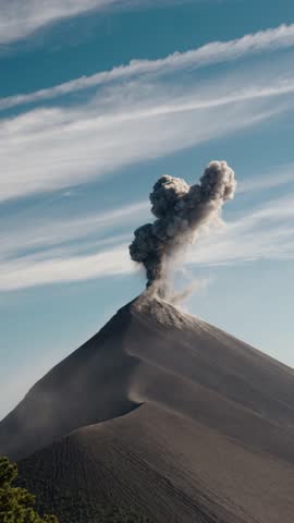 Ash plume erupting from Volcan de Fuego crater in Guatemala