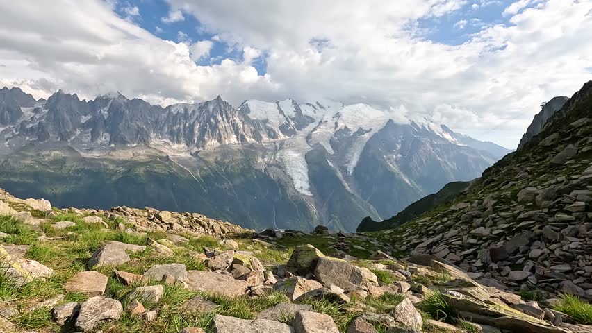 White Clouds Over Mont Blanc From Col du Brevent In Haute-Savoie, France. - timelapse shot