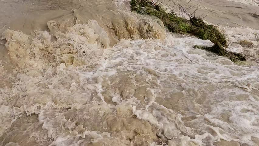 wild mountain river cascading after a rainstorm