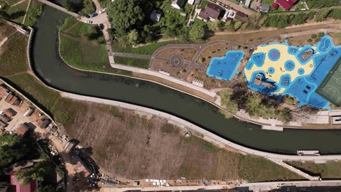 Lateral Drone Movement above River Playground