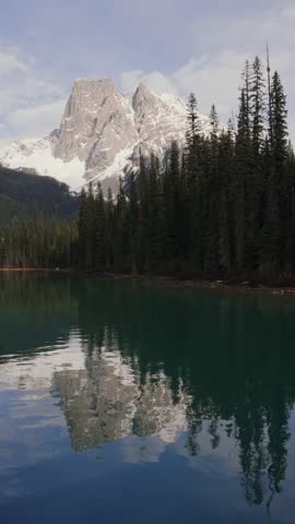 Emerald Lake reflections of Canadian Rockies mountains in Yoho National Park