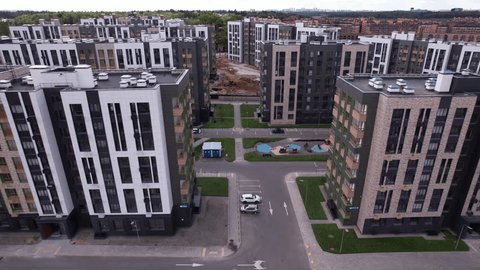 Backward Upward Drone Flight above Rafinad Housing