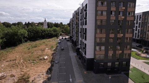Drone Flying Forward along Residential Street Rafinad
