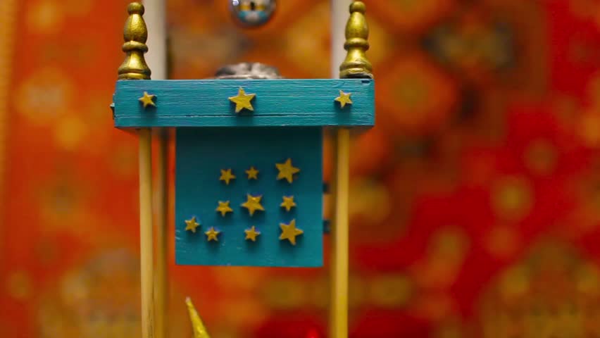 Star clock on the tower, rotating close-up