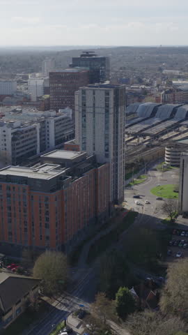 Vertical establishing aerial view of Reading, large town on the Thames and Kennet rivers in Berkshire, England, United Kingdom