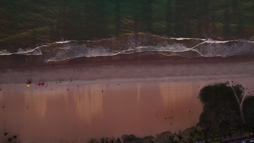 Stunning aerial view of a tropical beach in João Pessoa, Brazil, featuring turquoise ocean water, golden sand, and a peaceful coastline under bright sunlight. Perfect destination scene for travel, tourism, summer vacation, and Brazilian paradise concepts.