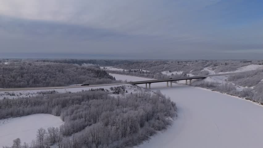 River Is Covered With Snow In Alberta