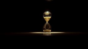 Close-up photograph of golden glittering sand leaking out of an hourglass. - Powered by Shutterstock - Get 15% off with code: PIKWIZARD15