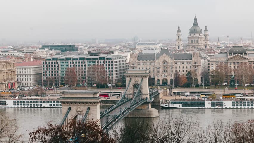 Footage of a bridge in Budapest. Traffic is seen moving across the Szechenyi Chain bridge between Buda and Pest, and the St. Stephen