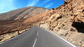Scenic mountain road trip captured from vehicle point of view, smooth asphalt highway crossing wild nature, concept of vacation, mobility and adventure travel - Powered by Shutterstock - Get 15% off with code: PIKWIZARD15