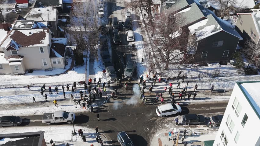 People confronting against ICE agents after the killing of Alex Pretti in M'inneapolis Minnesota aerial footage