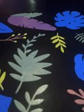 Colorful Digital Leaf Pattern Projection on Dark Floor in Modern Art Gallery - Powered by Shutterstock - Get 15% off with code: PIKWIZARD15
