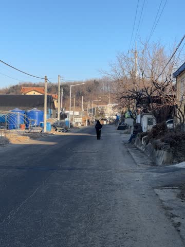 Scenic Winter Landscape of Snow Covered Rural Village and Mountains in South Korea