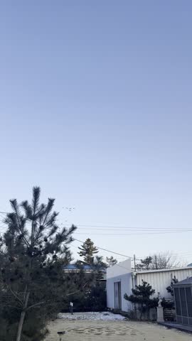 Scenic Winter Landscape of Snow Covered Rural Village and Mountains in South Korea