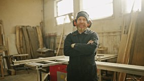 Happy Carpenter Showing Thumbs Up in Workshop 4K - Powered by Shutterstock - Get 15% off with code: PIKWIZARD15
