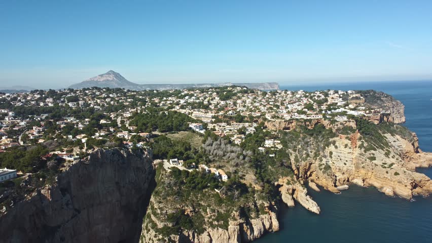 Cabo de la Nau cliffs and lighthouse, Spain, drone view