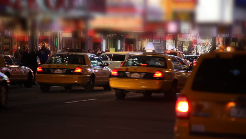 Taxis passing by on Times Square Manhattan, New York City / HD1080 / 29.97fps
