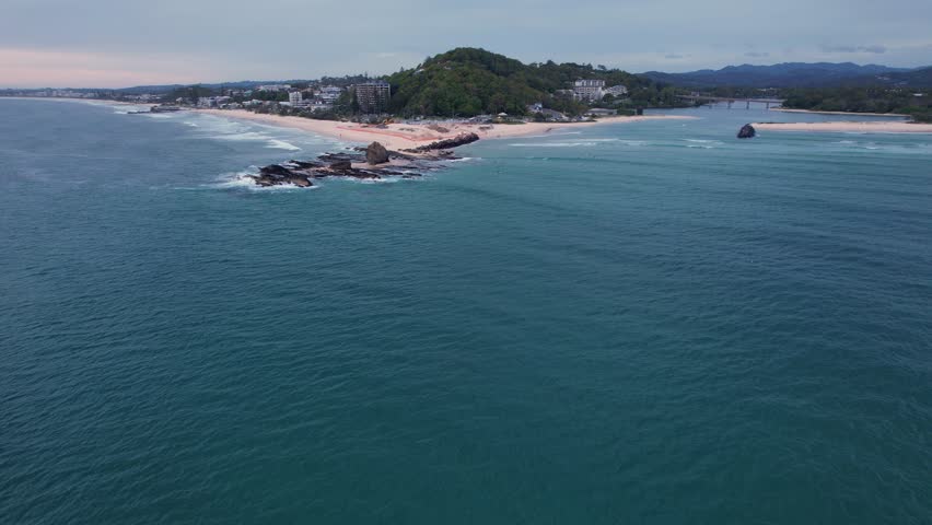 Currumbin Rock, Beach, And Point At Sunrise - Currumbin Creek In Gold Coast, QLD, Australia. - aerial shot