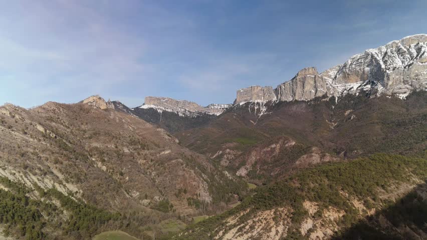A mountain range with a lot of snow on it.