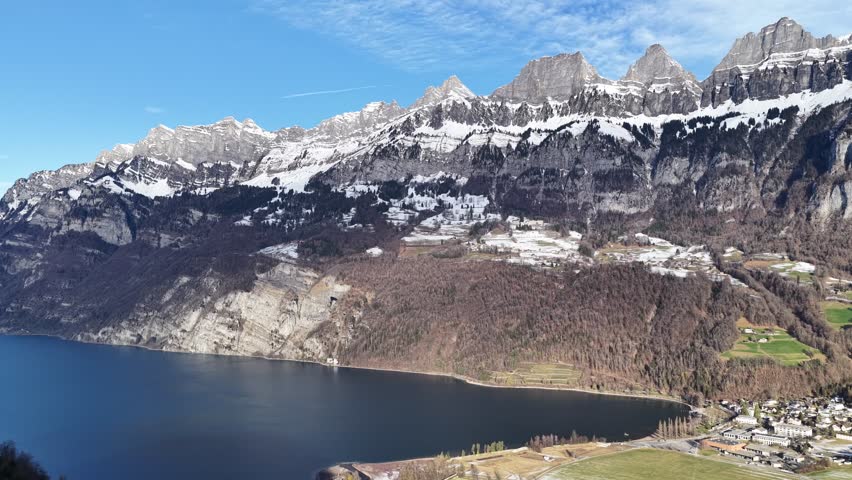 Aerial view of Walensee lake and Churfirsten mountains above Walenstadt Switzerland