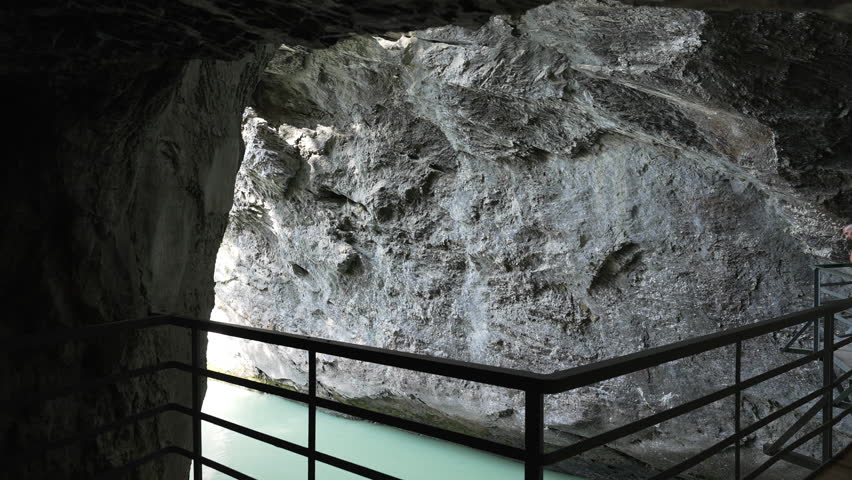 Walkway Inside Aare Gorge with Rock Walls and River