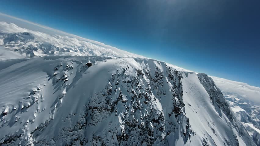 Unique footage of a drone flying over the summit of Pobeda Peak. Kyrgyzstan, Tien Shan. 4K