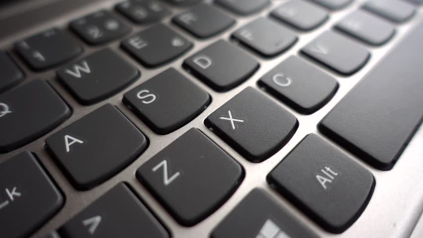 A Detailed Closeup Shot of a Sleek and Modern Computer Keyboard Showing the Keys Distinctly