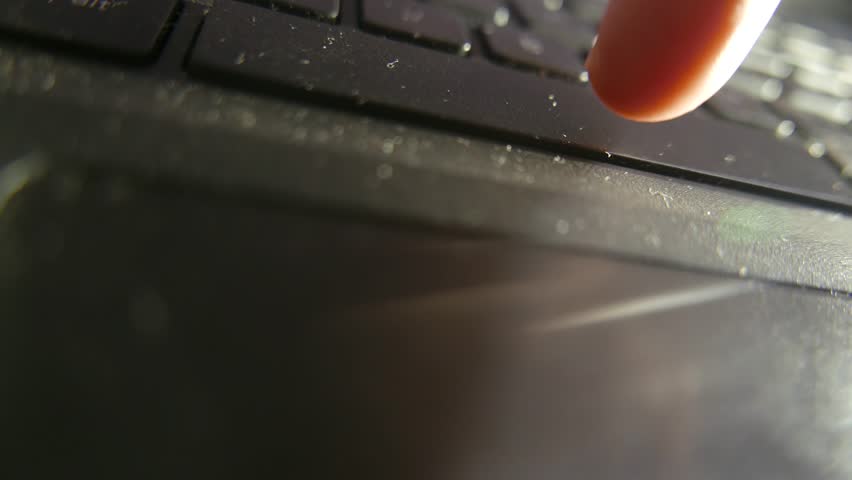 POV: Someone repeatedly pressing the spacebar on a computer keyboard. A person continuously pressing the spacebar on a laptop. A laptop keyboard. A touchpad.