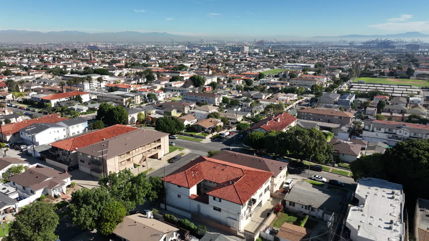 San Pedro, California, USA - Aerial View of Residential Homes Overlooking Vincent Thomas Bridge and the Port of Long Beach, CA