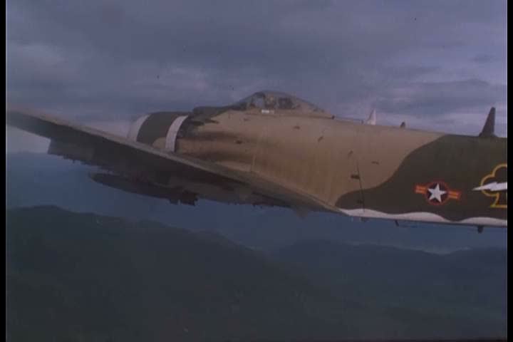 1960s - Fighter jets and other planes in flight during the Vietnam War.