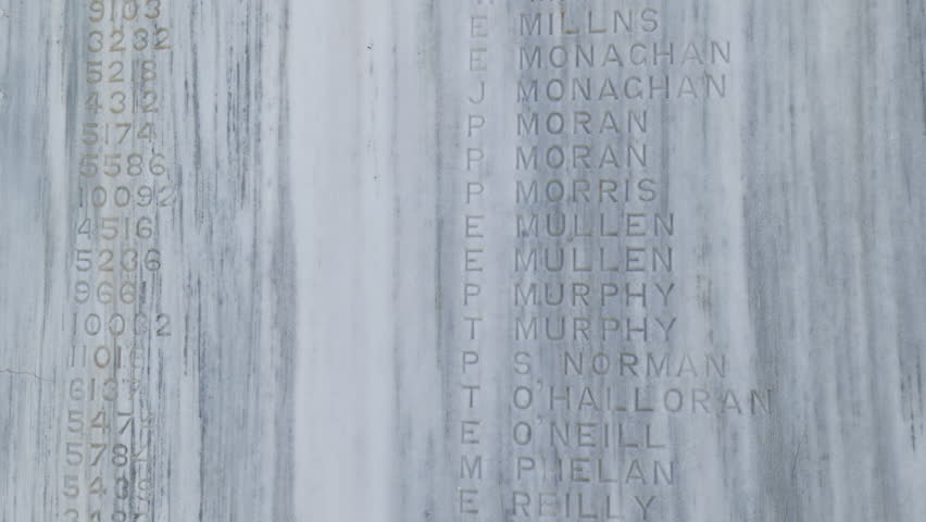 Close up tilt shot of engraved soldier names at Doiran Memorial in northern Greece honoring British and Commonwealth fallen of the World War One Macedonian Front