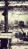 Cinematic View of an Industrial Complex with Metal Girders, Cables, and Barrels in a Gritty Atmosphere - Powered by Shutterstock - Get 15% off with code: PIKWIZARD15