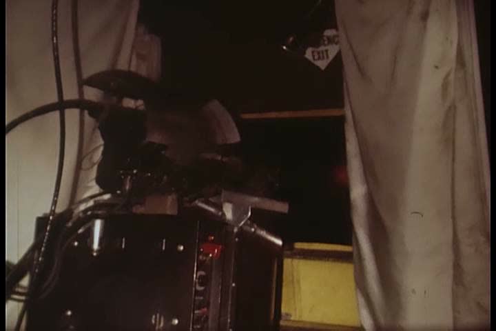 1960s - A machine gun lights up the night during the Vietnam War.