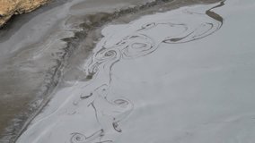 Hot Mud Pot In The Geothermal Area In Iceland. Close-up Shot - Powered by Shutterstock - Get 15% off with code: PIKWIZARD15