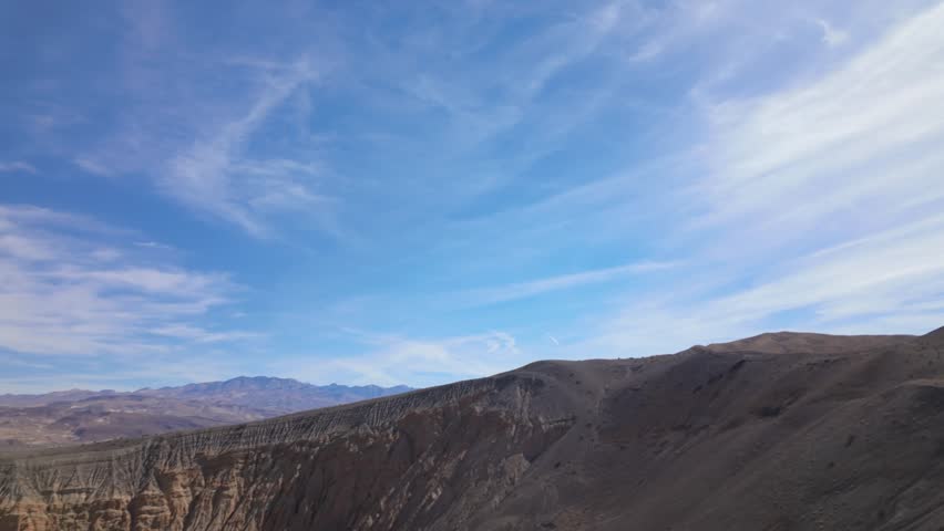 Gimbal close-up booming down shot of Ubehebe Crater in Death Valley, California. 4K
