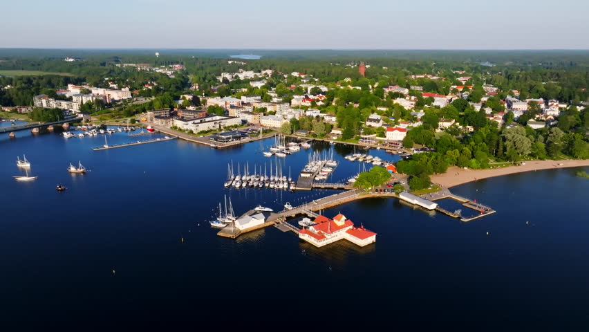 Panoramic drone shot circling the Tammisaari city, summer sunset in Finland