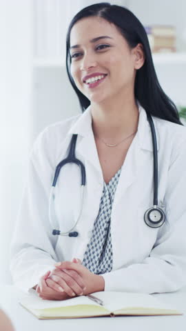 Doctor, woman and appointment in office with advice, conversation and medical checkup for wellness. Person, healthcare worker and discussion in clinic with consultation, diagnosis feedback and help.